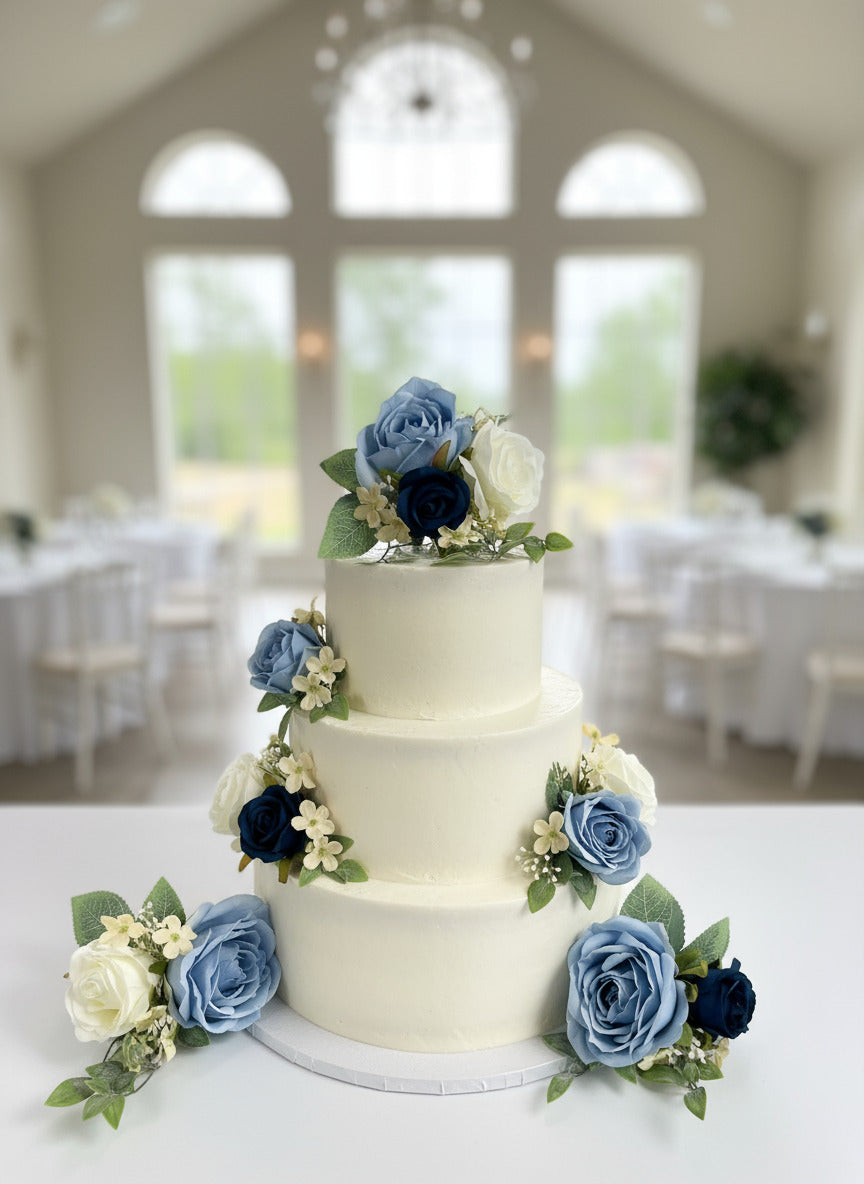 Overhead shot of various colors of fresh-cut roses (pure white, deep red, soft lavender) symbolizing different meanings of sympathy and remembrance, arranged on a black cloth.